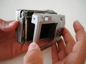 Disassembling Sony Cyber-shot DSC-W5 Back Cover