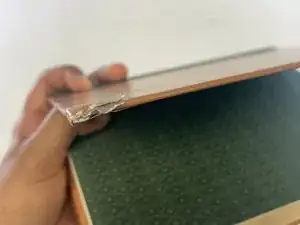 How to Repair Bumped Corners on a Hardcover Book