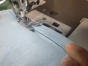 How to Shorten Pant Legs With a Sewing Machine