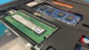 Depending on your machines current configuration, you may need to remove a RAM chip before you can insert your new ones.