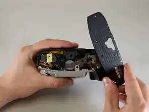 Disassembling Minolta Maxxum STsi Bottom Panel