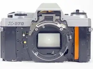 Removing Minolta X-370 Lens Holder