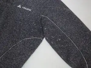 How do I remove pilling from my Vaude pullover?