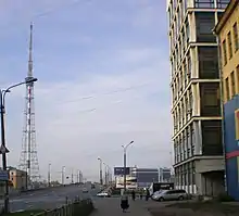 Saint Petersburg TV Tower (left) and the bridge (center) taken alongside several high-rise apartments