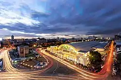 Aerial view of Hua Lamphong railway station in evening, the road on the right and parallel to the station is Rong Mueang road.