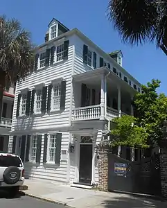 The Douxsaint House, part of the Grand Model, a Charleston single house of French type construction appears to have been built in the mid 1700s and is one of the two houses in its block that escaped the Great Fire of 1775