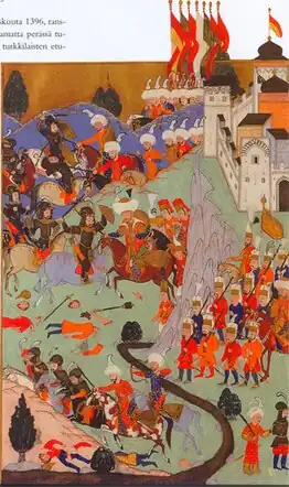 Horsemen and infantry fighting at a fortress on a river