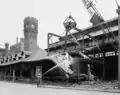 The station's train shed being demolished in May 1976; the "head house" can be seen at the rear