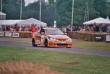 Matt Neal demonstrates a Team Dynamics Honda Integra at the 2006 Goodwood Festival of Speed