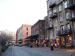 The River Street façade (center), with the Lowden Building closest to the camera