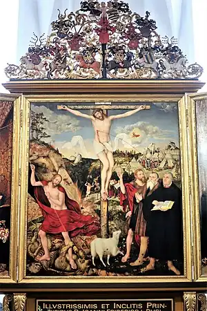 Altar panel of the Church of St. Peter and Paul in Weimar depicts the Crucifixion of Jesus with Lucas Cranach the Elder and Martin Luther standing on the right