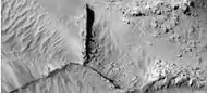 Narrow ridges, as seen by HiRISE under HiWish program.  The ridges may be the result of impacts fracturing the surface.