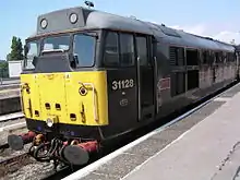 31128 Charybdis at Bristol Temple Meads on 23 July 2004. This locomotive was owned by Fragonset Railways, but hired to Wessex Trains to haul trains from Bristol to Brighton and Weymouth.