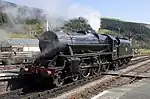 44806 Running round its train at Carrog.