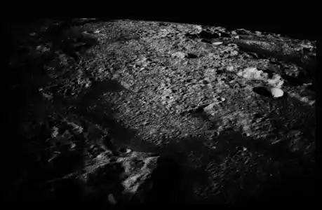 Apollo 17 photographed eastern Mare Orientale in the faint light of earthshine.