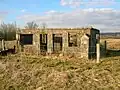 A ruin within the Nettlehirst grounds bearing an 1811 marriage stone.