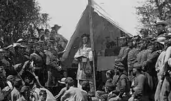 Chaplain leading prayers-69th New York Infantry Irish Brigade. Note the use of civilian hats by the men.