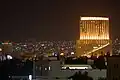 Le Royal Hotel and cityscape at night