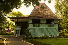 The large front windows of Apolinario Mabini's bahay kubo house augmented by ventanillas.