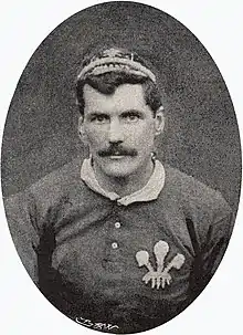 Upper body shot of Gould wearing his Wales cap and jersey