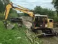 A road-rail digger being used to re-lay the line at the Loop Platform.