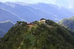 Structures on top of a mountain in Atok