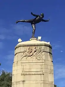 Sculpture of an athlete by Richard Gross (1935) at the Elliot Memorial gates.