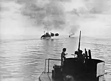 Image 19HMAS Australia and Arunta bombarding Cape Gloucester (from Military history of Australia during World War II)