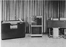 The popular IBM 1401, introduced in 1959 featured a fast card reader/punch, the IBM 1402, left