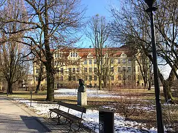 Bust of Bach with the Copernicanum building