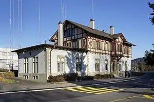 Two-story building with gabled roof