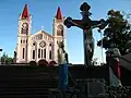 The cathedral from the stairs with the large Calvary at the terminus of the stone stairs