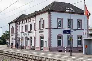 Two-story building with hipped roof