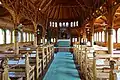 Interior. The rope is used to operate the church bells.