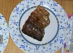 Deep-fried chunk of pickled (pla som) silver barb (Pla taphian)