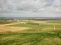 A view of Craigie Castle in its landscape from Barnweill Kirk ruins.