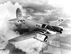 Black and White photo of Beechcraft AT-10 Wichita in flight from above