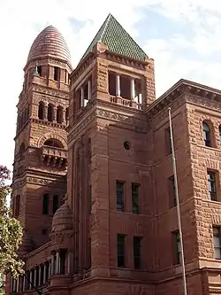 The Bexar County Courthouse in downtown San Antonio, Texas, United States, an exuberant example of Romanesque Revival, built in 1892, launched Gordon's career.