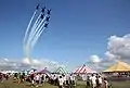 The Navy's Flight Demonstration team, the Blue Angels, perform their delta formation during the Indianapolis Air Show.