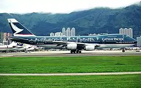 A Boeing 747-200B (B-HIB) in The Spirit of Hong Kong 97 special livery.