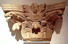 Buddha in acanthus capital