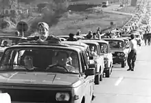 Long queues of cars waiting to cross the Wartha border crossing into West Germany on 10 November 1989, a day after the fall of the Berlin Wall.