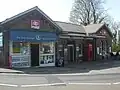 Main street-level building on Station Road, housing the ticket office and newsagent