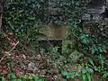 Detail of an opening in the gable end of the old mill