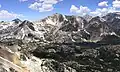 Northeast aspect of Camiaca Peak with East Lake at the foot of the peak.