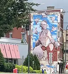 This photo is taken of a mural near downtown Cincinnati where the meat packing businesses were located.  It shows a cow named Cincinnati Freedom who escaped from the slaughtehouse, and later  lived out her life in a farm sanctuary in the state of New York.