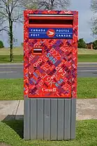 Post box in Markham, Ontario, Canada, decorated with postal codes