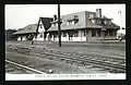 A view across the tracks of the Canadian National Station in Wainwright, between 1926 and 1940.