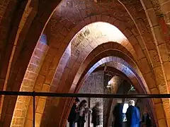 Catenary arches inside the Casa Milà in Barcelona, Spain by Antoni Gaudí (2010}