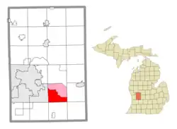 Location within Kent County (red) and an administered portion of the Forest Hills CDP (pink)